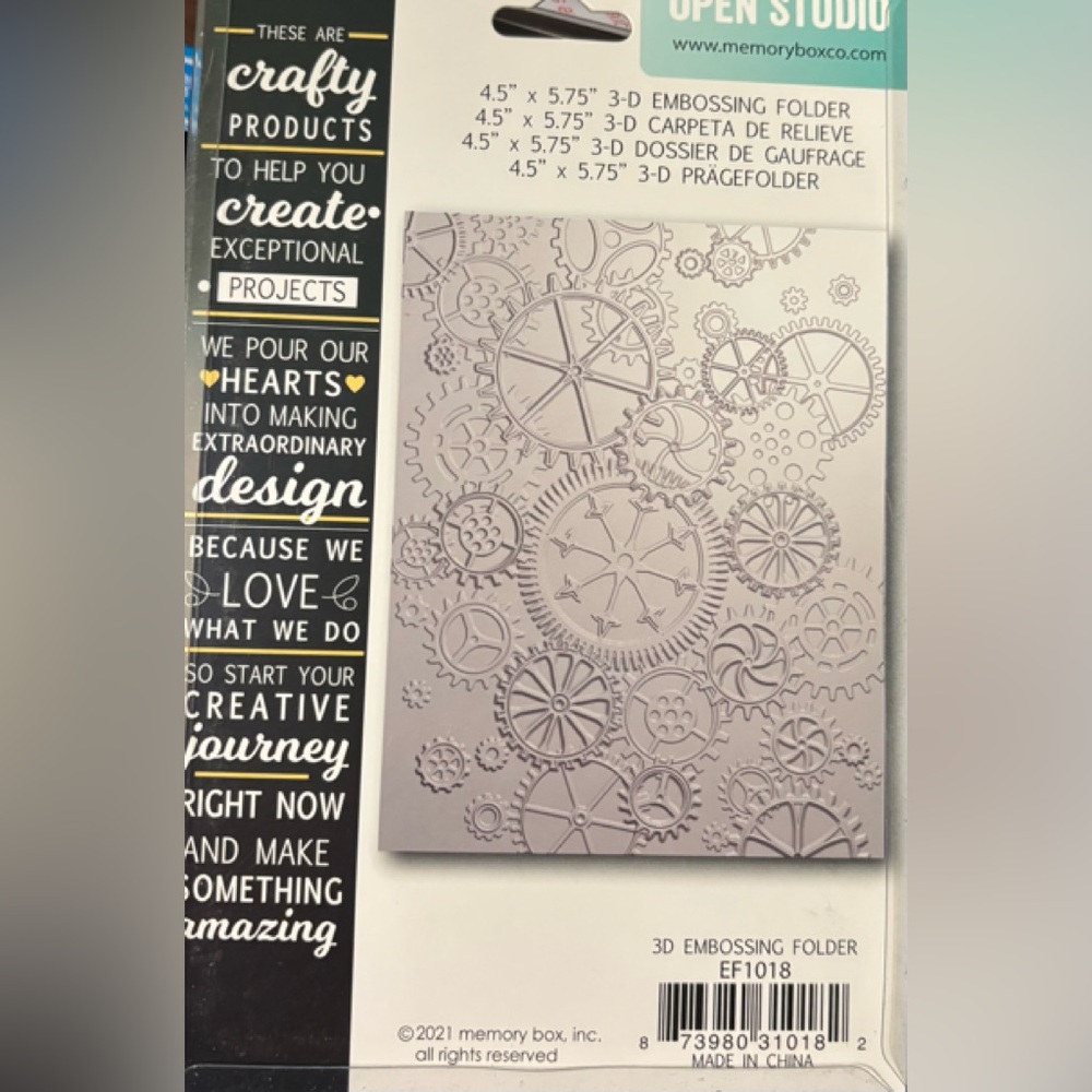 3D Embossing Folder by Memory Box. Features cogs and wheels.